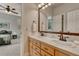 Bathroom featuring double sinks and vanity at 581 Stonemont Dr, Castle Pines, CO 80108
