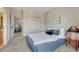 Bedroom with walk-in closet and soothing colors at 581 Stonemont Dr, Castle Pines, CO 80108