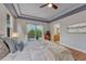 Spacious main bedroom with tray ceiling and access to main bathroom at 581 Stonemont Dr, Castle Pines, CO 80108