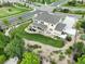 Aerial view of the property, highlighting its landscaped yard, spacious layout, and integration with the surrounding environment at 23451 E Rockinghorse Pkwy, Aurora, CO 80016