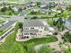 Aerial view of the property showcasing its expansive backyard, neighborhood setting, and convenient access to nearby amenities at 23451 E Rockinghorse Pkwy, Aurora, CO 80016