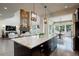 Spacious kitchen with granite countertops, modern appliances, and ample cabinet space at 23451 E Rockinghorse Pkwy, Aurora, CO 80016