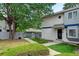 Charming home featuring a well-maintained yard and inviting entryway; perfect for suburban living at 2213 Emery St # C, Longmont, CO 80501