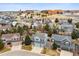 Scenic aerial view of a residential area with well-maintained homes and proximity to schools at 9928 Candlewood Ct, Highlands Ranch, CO 80126