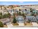 Scenic aerial view of a residential area with well-maintained homes and proximity to schools at 9928 Candlewood Ct, Highlands Ranch, CO 80126