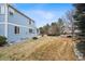 Large backyard with a wood deck and lush landscaping at 9928 Candlewood Ct, Highlands Ranch, CO 80126