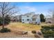 Large backyard with a wood deck and lush landscaping at 9928 Candlewood Ct, Highlands Ranch, CO 80126