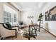 Bright office featuring a tray ceiling, neutral walls, modern furnishings and a large window for natural light at 9928 Candlewood Ct, Highlands Ranch, CO 80126