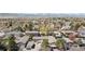 Wide aerial view of the neighborhood, showcasing surrounding trees, houses, and greenery at 8367 S Reed St # A3, Littleton, CO 80128