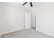 Bedroom with neutral walls, closet, carpet and bright natural light at 8367 S Reed St # A3, Littleton, CO 80128