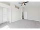 Bright bedroom with closet and soft carpeting at 8367 S Reed St # A3, Littleton, CO 80128