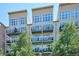 Close-up view of the building's exterior and balconies at 7240 W Custer Ave # 215, Lakewood, CO 80226