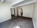 Bedroom with carpeted floors, closet and bathroom access at 9995 E Harvard Ave # 261, Denver, CO 80231