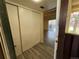 Entryway with white closet and views of living area at 9995 E Harvard Ave # 261, Denver, CO 80231