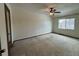 An empty bedroom with a ceiling fan and a window providing natural light at 1170 W 135Th Dr, Denver, CO 80234