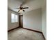 Bedroom with ceiling fan and window, offering a cozy and adaptable space at 1170 W 135Th Dr, Denver, CO 80234