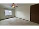 Bedroom featuring a window and ceiling fan, offering potential customization at 1170 W 135Th Dr, Denver, CO 80234