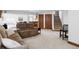 Spacious basement with carpeting and staircase, perfect for flexible living or entertaining at 9257 Shadowglen Ct, Highlands Ranch, CO 80126