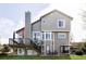 Back of the house with large deck, multiple windows, and gazebo, ideal for outdoor living at 9257 Shadowglen Ct, Highlands Ranch, CO 80126