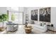 Bright living room featuring a plush sofa, accent chair, and stylish decor at 9257 Shadowglen Ct, Highlands Ranch, CO 80126