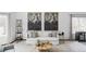 Beautiful living room with comfortable sofa and decorative wall art at 9257 Shadowglen Ct, Highlands Ranch, CO 80126