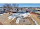 Large backyard with firepit area and mountain views at 1912 S Truckee St, Aurora, CO 80013