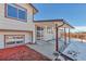 Covered patio with concrete flooring and wood posts at 1912 S Truckee St, Aurora, CO 80013