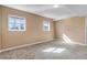 Bright, finished basement bedroom featuring neutral walls and carpet at 1912 S Truckee St, Aurora, CO 80013