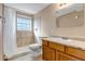 Clean bathroom with shower/tub combo, vanity, and tile flooring at 1912 S Truckee St, Aurora, CO 80013