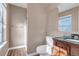 Clean bathroom, includes toilet, sink, and shower at 1912 S Truckee St, Aurora, CO 80013