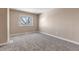 Simple bedroom with carpet, window, and closet at 1912 S Truckee St, Aurora, CO 80013