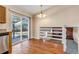 Dining area with hardwood floors and view to backyard at 1912 S Truckee St, Aurora, CO 80013