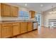 Kitchen with wood cabinets, stainless steel appliances at 1912 S Truckee St, Aurora, CO 80013