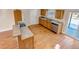 Open kitchen with wood cabinets and island at 1912 S Truckee St, Aurora, CO 80013