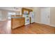 Kitchen with wood cabinets and white appliances at 1912 S Truckee St, Aurora, CO 80013