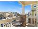 Private balcony with table and chairs, overlooking neighborhood at 9489 Ashbury Cir # 202, Parker, CO 80134