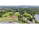 Aerial view of lush green park with a pond, walking trails and the Museum of Nature and Science at 3429 N Adams St, Denver, CO 80205