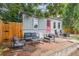 Inviting backyard featuring a brick patio with outdoor seating, ideal for relaxing at 3429 N Adams St, Denver, CO 80205