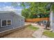 Backyard with patio space, wooden fence, and potential for landscaping at 3429 N Adams St, Denver, CO 80205
