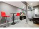 Finished basement features a bar area, mountain art and a cozy seating space at 3429 N Adams St, Denver, CO 80205