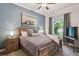 Bedroom with ceiling fan, neutral decor, side tables and window at 3429 N Adams St, Denver, CO 80205