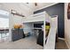 Fun bedroom featuring lofted bed with slide, desk, and playful decor, perfect for a  at 3429 N Adams St, Denver, CO 80205