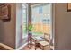 Bright dining nook by windows, featuring corner desk and plant at 3429 N Adams St, Denver, CO 80205