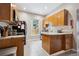 Kitchen with stainless appliances, light granite countertops and window at 3429 N Adams St, Denver, CO 80205