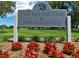 Park Hill Golf Club & 35th Avenue Grill sign surrounded by flowers and green lawns at 3429 N Adams St, Denver, CO 80205