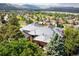 Expansive home with mature trees and mountain views at 15895 W Bayaud Dr, Golden, CO 80401