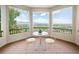 Enjoy mountain views from the outdoor balcony area with seating for two at 15895 W Bayaud Dr, Golden, CO 80401