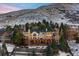 Stunning home with expansive deck nestled against a picturesque mountain backdrop at 15895 W Bayaud Dr, Golden, CO 80401