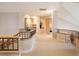 Elegant hallway with hardwood floors and metal railings at 15895 W Bayaud Dr, Golden, CO 80401