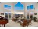 Bright living room with soaring windows and panoramic views at 15895 W Bayaud Dr, Golden, CO 80401